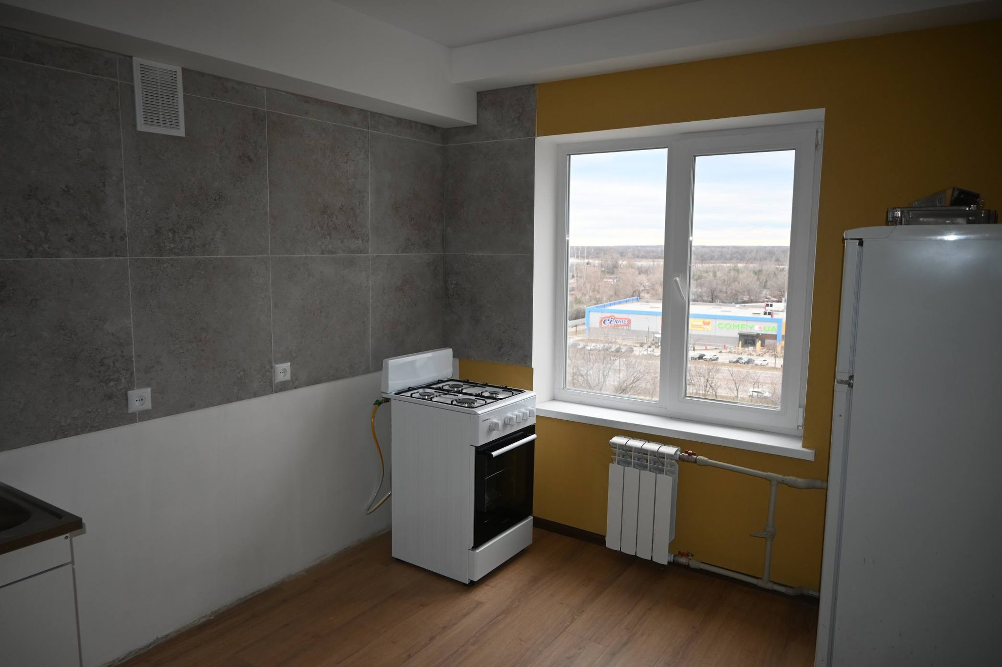 Ще одна завершена відбудова: у Запоріжжі відновили будинок в Олександрівському районі